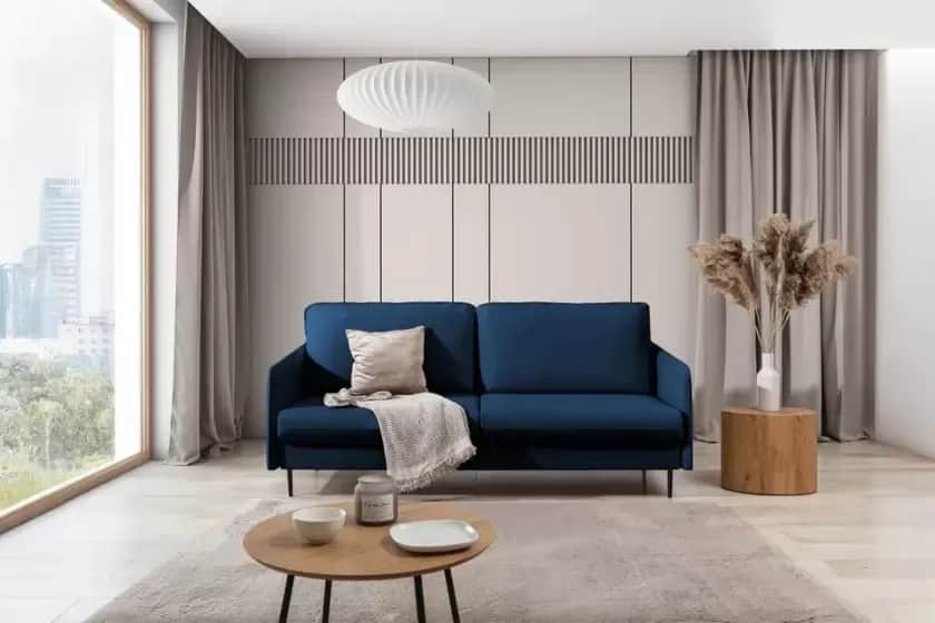 Jakie meble do granatowej kanapy, aby stworzyć stylowy i przytulny salon?